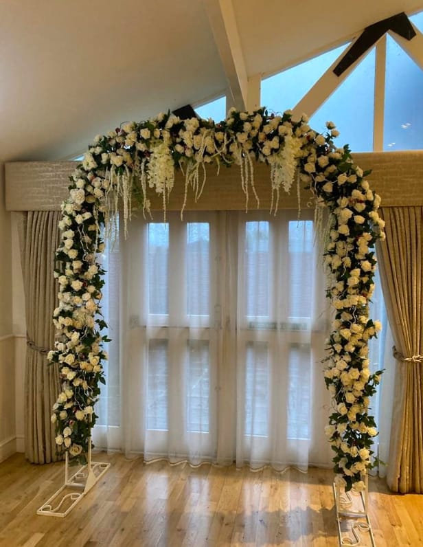 Wedding Arch with Two Rose Trees and Six Centre Piece Stands